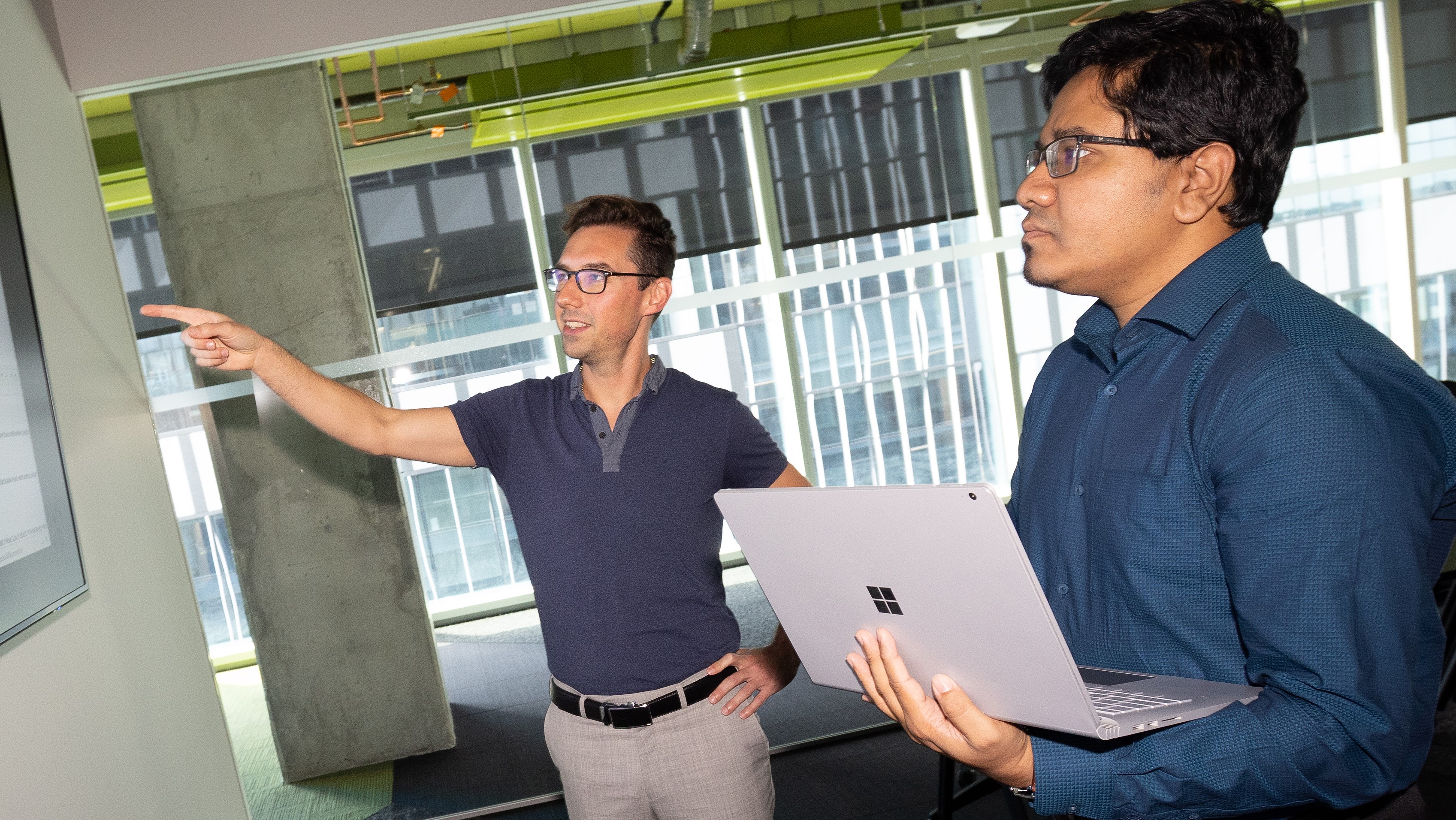 Professional project managers presenting technology solutions and strategies